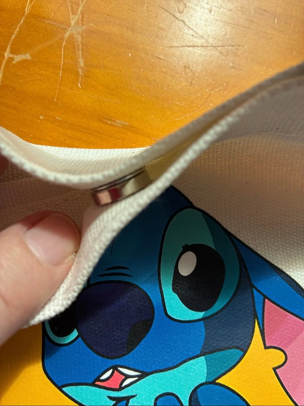 Stitch Canvas Tote in Cream with Blue Stitch Graphic. It’s a Crossbody bag too